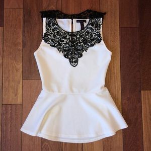 White and Black Peplum Top